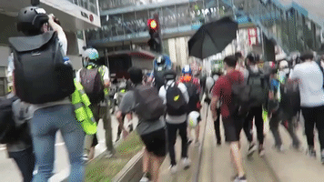 Police and Activists Clash in Hong Kong Amid Protests Against Proposed Security Law