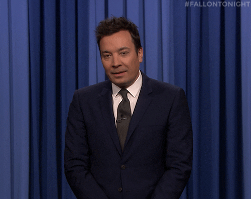 Tonight Show gif. Jimmy Fallon as host nods in recognition saying "Sup?" and gesturing with his hand. 