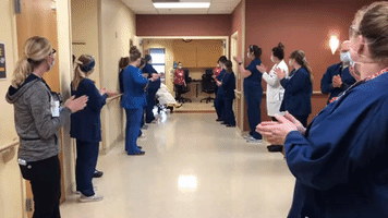 Grand Rapids Hospital Staff Cheer as First COVID-19 Patient is Discharged