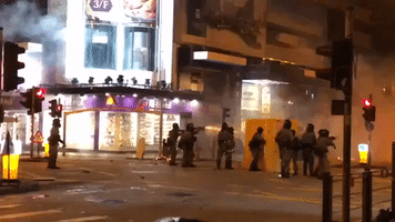 Hong Kong Police Fire Tear Gas at Protesters Near Polytechnic University