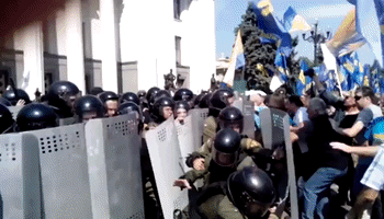 Ukrainian Riot Police Clash with Protesters Outside Parliament