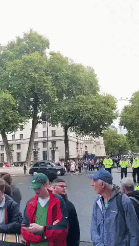 Crowd Waits Outside 10 Downing Street as Truss Resigns