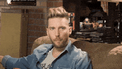 RETROREPLAY whatever shrug troy baker retro replay GIF