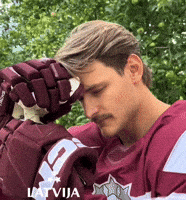 Smirk Latvia GIF