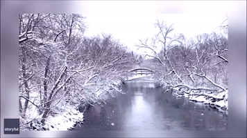 Snow Flurries Sweep Across the Minnesota River
