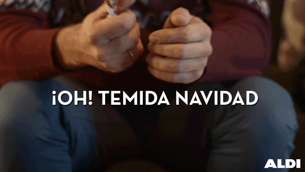 Ad gif. Person sitting down squeezes a small wrapped object in their hand. Text, in Spanish, "Oh! Temida Navidad."