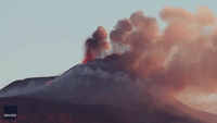 Lava Shoots From Mount Etna During Dawn Eruption