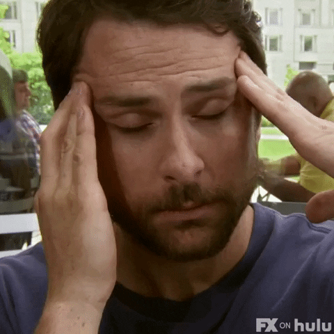 TV gif. Charlie on It's Always Sunny in Philadelphia closes his eyes as he rubs his temples before one eye pops open.