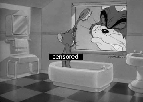 tom and jerry fighting GIF