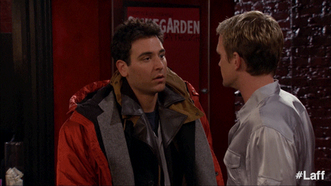 TV gif. Josh Radnor as Ted in How I Met Your Mother reacts to Neil Patrick Harris as Barney in shock with a surprised, “What??”