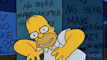 The Simpsons gif. In a Treehouse of Horror episode, Homer makes crazy faces, screams, and does silly dances while saying crazy things, “hey hoo hey hoo, blahblahblah, bvzzzt bvzzzt. Ughhhhh.” He has written on the walls. Text, “no beer makes homer go crazy.”