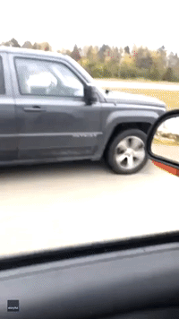 Woman Tries to Tell Driver About Popped Tire on Detroit Highway