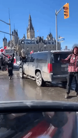 'Freedom Convoy' Supporters Cheer Outside Parliament Hill in Ottawa