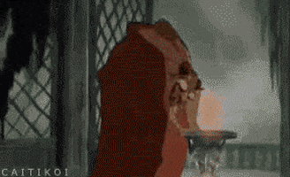 beauty and the beast sigh GIF