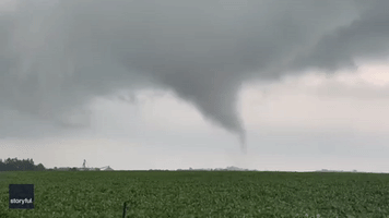 Funnel Cloud Whips Up Debris in Sycamore Amid Tornado Warnings in Illinois