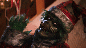 TheMeanOne wave waving christmas horror mean one GIF