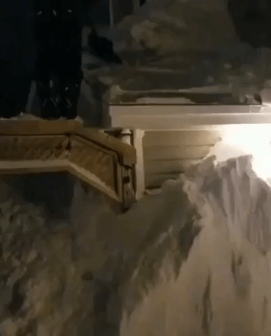 Residents Work to Clear Several Feet of Snow From Newfoundland Neighborhoods