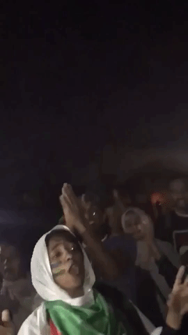 Sudanese Woman Leads Chant at Khartoum Protest