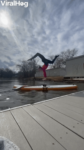 Mesmerizing Handstand on a Paddleboard