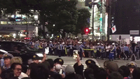 Jubilant Soccer Fans Celebrate Japan's World Cup Opening Win in Tokyo