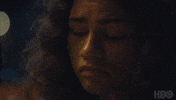 TV gif. Zendaya as Rue in Euphoria. She looks very downtrodden and upset as she pouts her lips, looking down before eventually flickering her eyes up to look at the person she's speaking with.