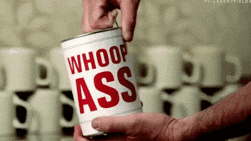 Video gif. Pair of hands open a can that is labeled, “Whoop Ass.” a mysterious liquid leaks out as the lid is pulled off.