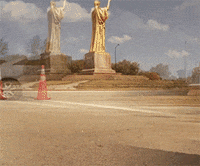 lovidhinkis-lapidus chicago traffic cones bikelane gold statue GIF