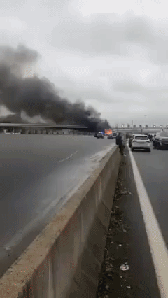 Truck in Police Chase Burns After Crashing Into Toll Barrier