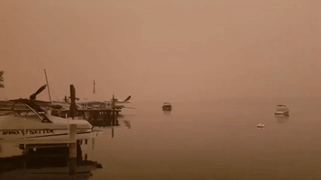 Smoke Shrouds Okanagan Lake as Wildfires Spread in British Columbia