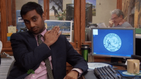 Parks And Recreation Brush Shoulders GIF