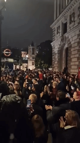 Crowd Cheers Near Westminster Abbey Following Moment of Silence for Late Queen
