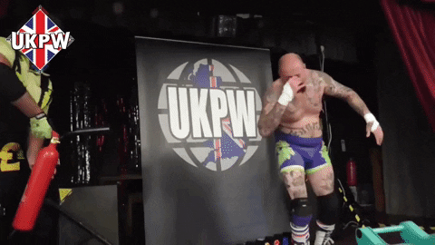 Dow Jones Fire Extinguisher GIF by United Kingdom Pro Wrestling
