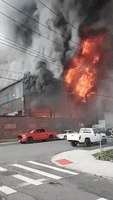 Massive Fire Breaks Out at Warehouse in Staten Island, New York