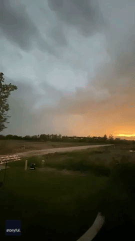Lightning Strike Illuminates Sky at Sunset in Texas