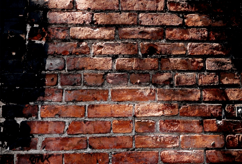break through brick wall GIF