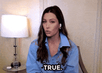 Celebrity gif. Jessica biel nods with a glance in affirmation. Text, "True."