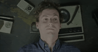 polyvinylrecords retro staring eyebrows record player GIF