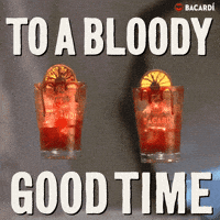Sponsored gif. Two orange cocktails in glasses bearing the Bacardi logo toast midscreen. The glasses are rimmed in a substance that resembles blood. Text: "TO A BLOODY GOOD TIME"