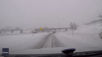 Michigan Motorist's Misfortune as Windscreen Smashed by Clumps of Snow Falling From Overpass