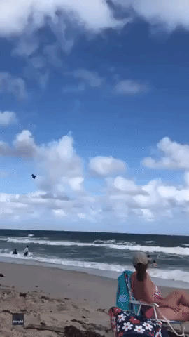 Gust From Fort Lauderdale Airshow Plane Pops Up Beach Parasol