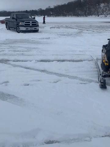 Vehicles Sink After Parking on Thin Lake Ice