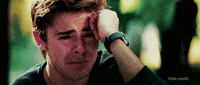 sad zac efron GIF
