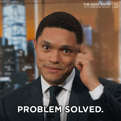 Celebrity gif. Trevor Noah of the Daily Show taps his head and gives us a knowing look. He says, “Problem solved.”