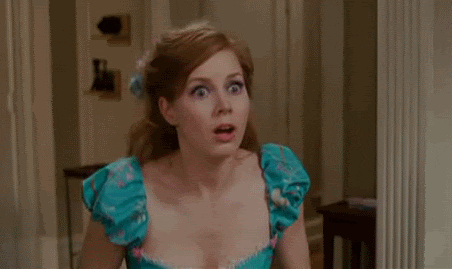Disney gif. Amy Adams as Giselle in "Enchanted" fans her hands over the sides of her face and beams with excitement.