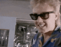 a kind of magic sunglasses GIF by Queen