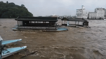 Boats Washed Away or Sunk by Fast-Flowing Floodwaters in Japan