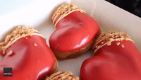 Competitive Eater Scoffs 12 Heart-Shaped Donuts in Valentine's Day Challenge