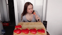 Competitive Eater Scoffs 12 Donuts for V-Day