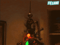 kissing christmas tree GIF by TV Land