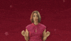 Video gif. A woman with wide eyes splays both hands open and slowly turns her head for emphasis as she says, "Wow."